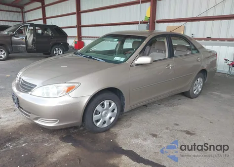 2003 Toyota Camry Le z USA, uszkodzony, nr VIN 4T1BE32KX3U143055
